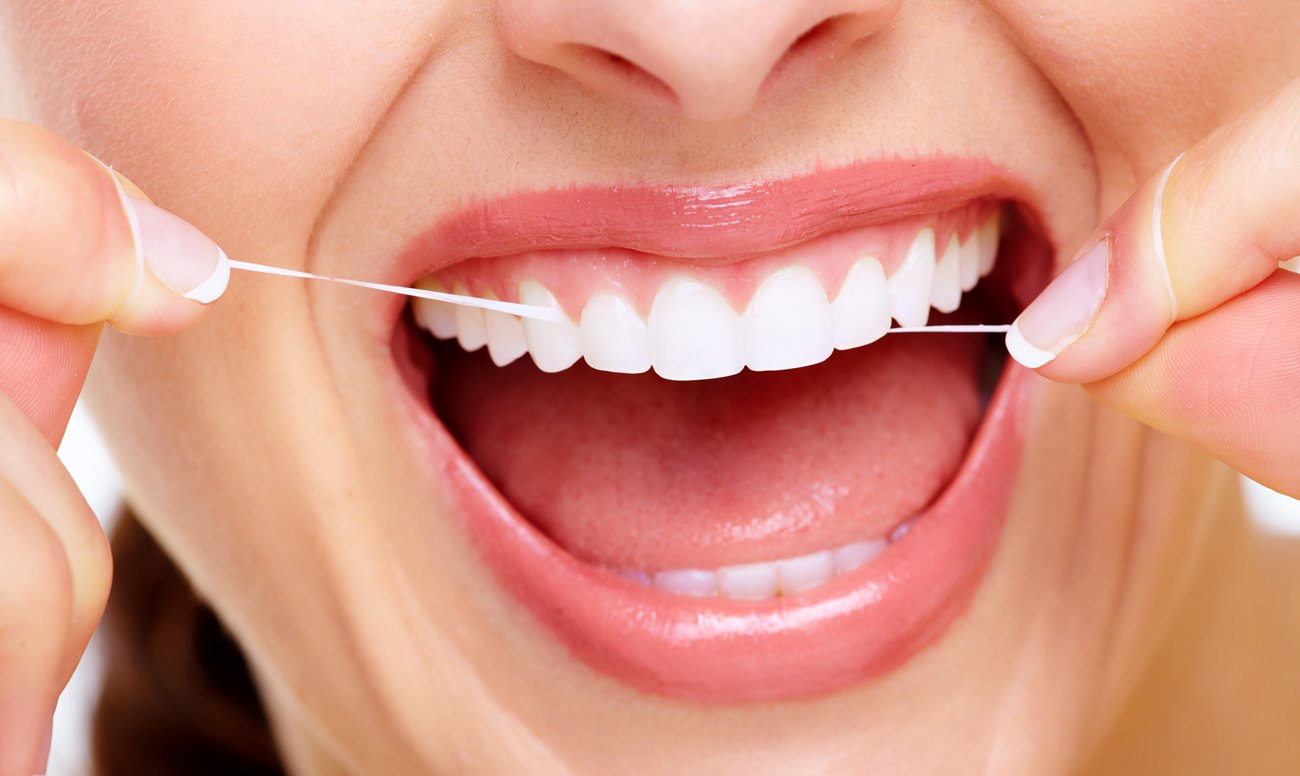 Зубная нить: виды, как пользоваться, для кого предназначена